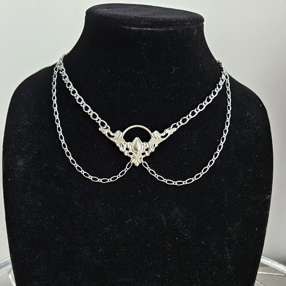 Stainless Steel Necklace With Filigree Center